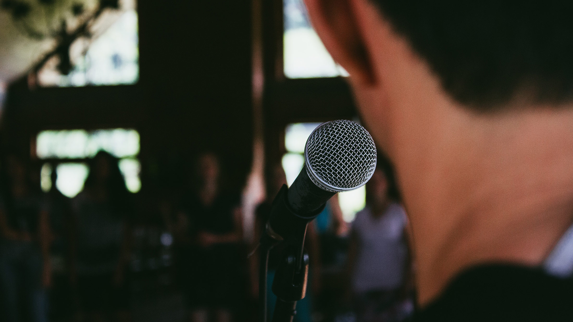 Speaking into Microphone